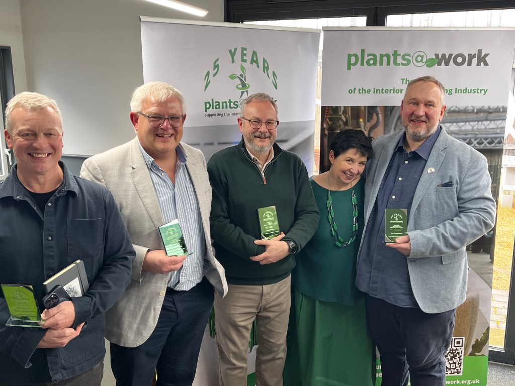 Image of three past chairs, the current chair and the administrator of Plants@Work
